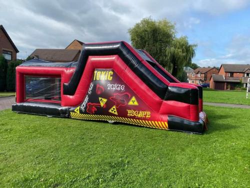 Climbing wall and obstacle course on Dob Lane Recreation Ground